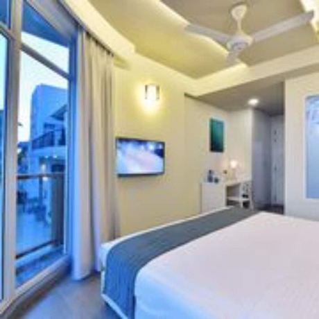 Imagen de la habitación del Hotel Velana Beach Maldives. Foto 5