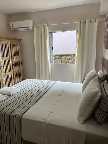 Imagen de la habitación del Hotel Velinn Pousada Iguana Azul. Foto 11