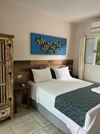Imagen de la habitación del Hotel Velinn Pousada Iguana Azul. Foto 12