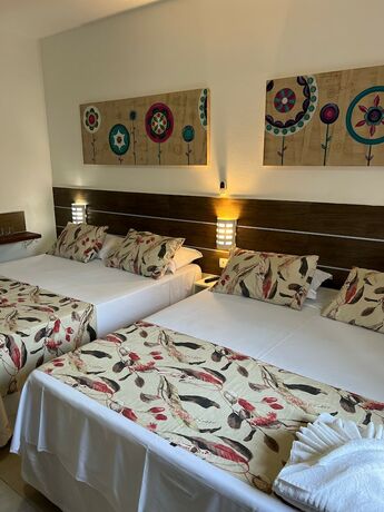 Imagen de la habitación del Hotel Velinn Pousada Iguana Azul. Foto 13