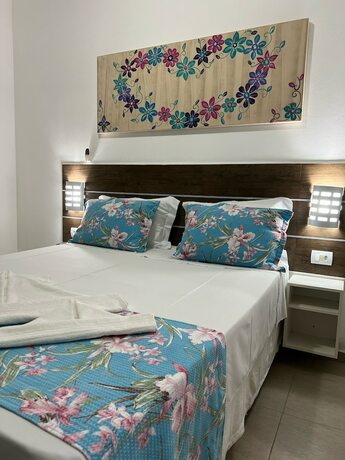 Imagen de la habitación del Hotel Velinn Pousada Iguana Azul. Foto 17