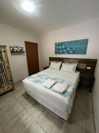 Imagen de la habitación del Hotel Velinn Pousada Iguana Azul. Foto 18