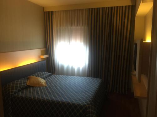 Imagen de la habitación del Hotel Velino. Foto 7