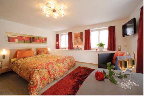 Imagen de la habitación del Hotel Velohotel Hirschen. Foto 16