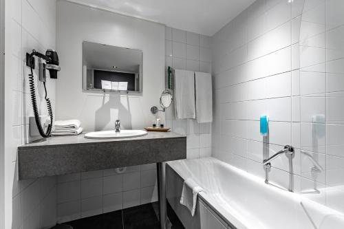 Imagen de la habitación del Hotel Velotel Brugge. Foto 6