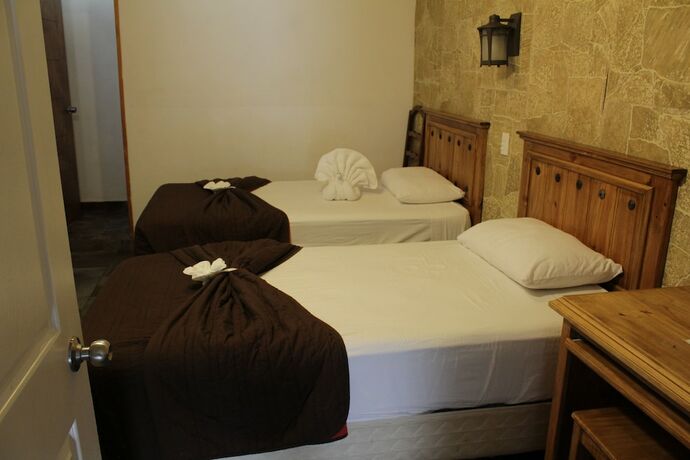 Imagen de la habitación del Hotel Venados Inn. Foto 18