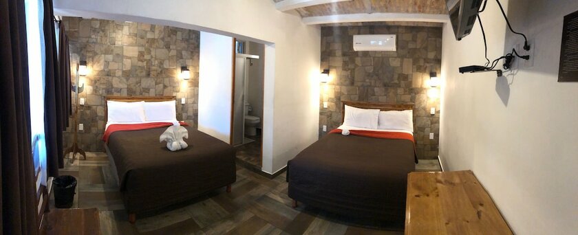 Imagen de la habitación del Hotel Venados Inn. Foto 19