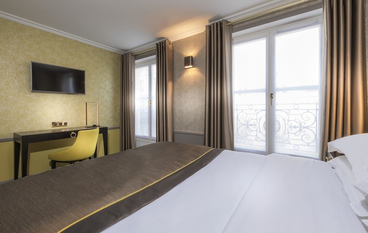 Imagen de la habitación del Hotel Vendôme Opéra. Foto 18