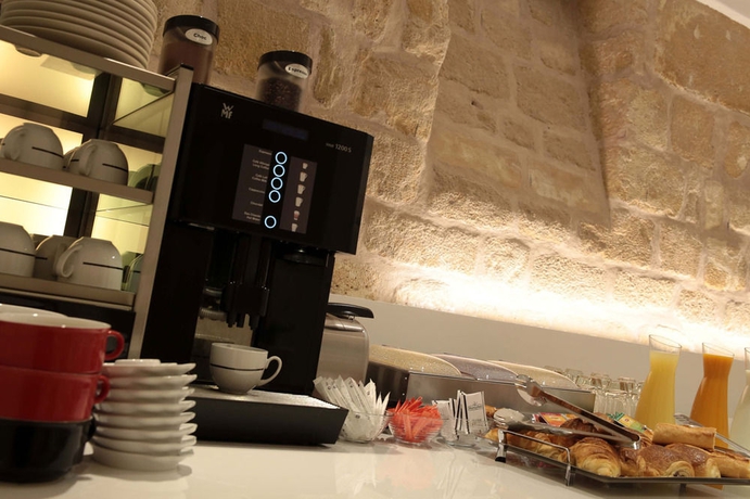 Imagen del bar/restaurante del Hotel Vendome Saint Germain. Foto 5