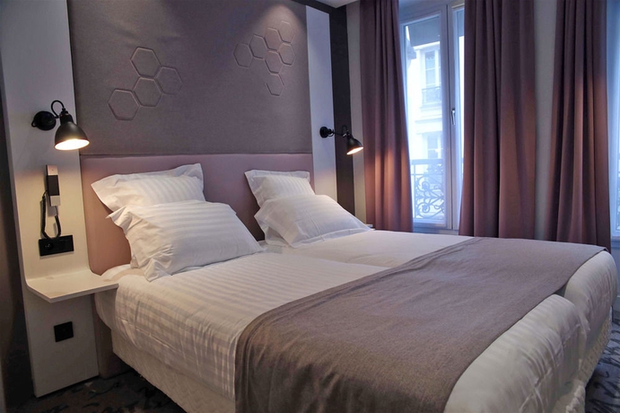 Imagen de la habitación del Hotel Vendome Saint Germain. Foto 14