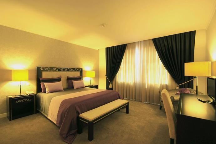 Imagen de la habitación del Hotel Veneza. Foto 2