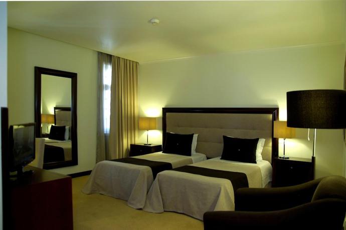 Imagen de la habitación del Hotel Veneza. Foto 6