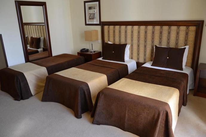 Imagen de la habitación del Hotel Veneza. Foto 8