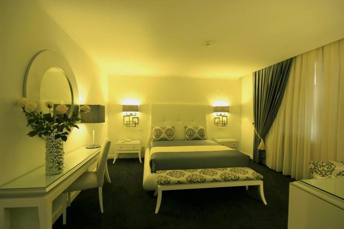 Imagen de la habitación del Hotel Veneza. Foto 11