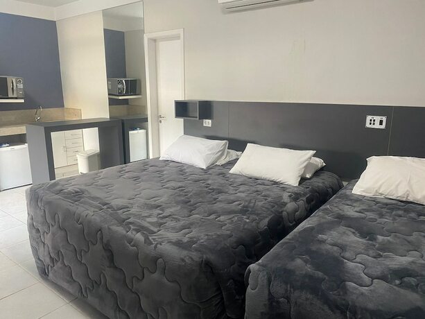 Imagen de la habitación del Hotel Veneza Palace. Foto 13