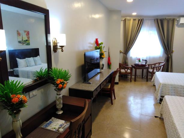 Imagen de la habitación del Hotel Venezia Suites Iloilo. Foto 3