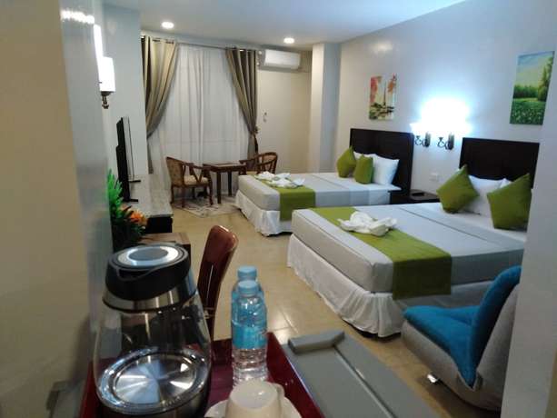 Imagen de la habitación del Hotel Venezia Suites Iloilo. Foto 6