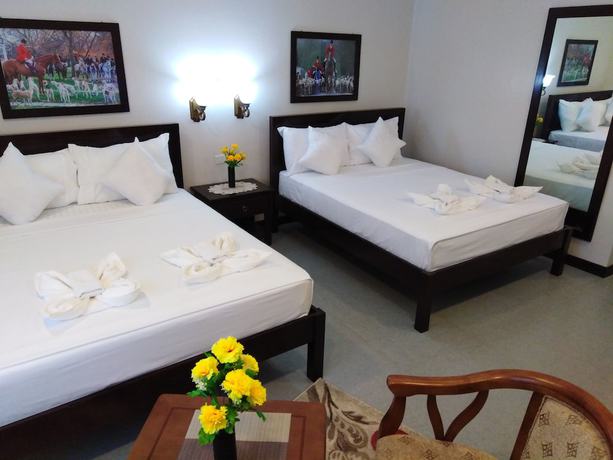 Imagen de la habitación del Hotel Venezia Suites Iloilo. Foto 7
