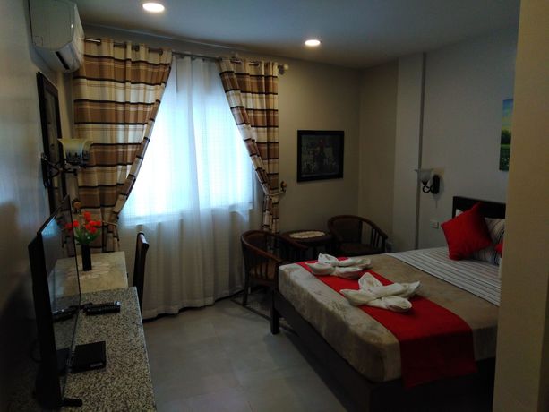 Imagen de la habitación del Hotel Venezia Suites Iloilo. Foto 11