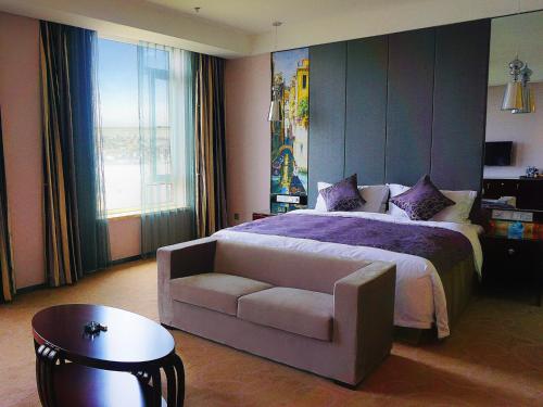 Imagen de la habitación del Hotel Venice Jian Guo Dandong. Foto 6