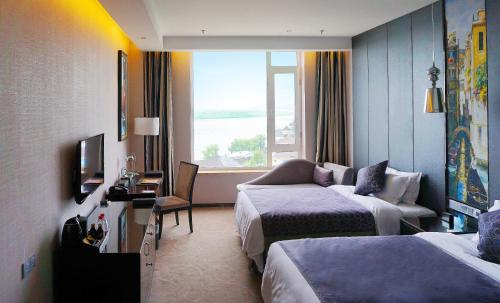 Imagen general del Hotel Venice Jian Guo Dandong. Foto 2