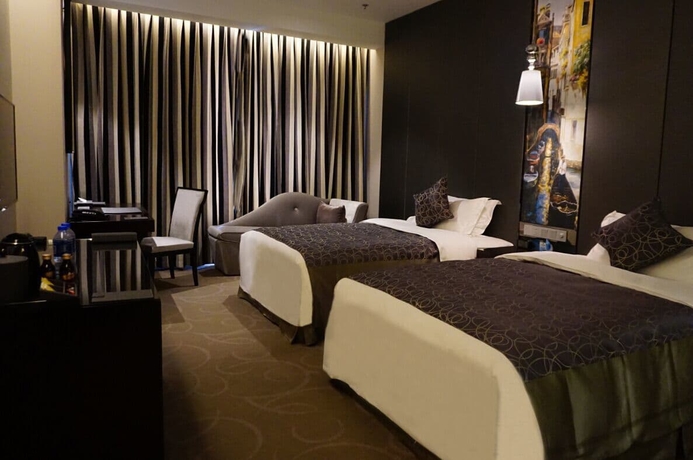 Imagen de la habitación del Hotel Venice Jianguo Dandong. Foto 9