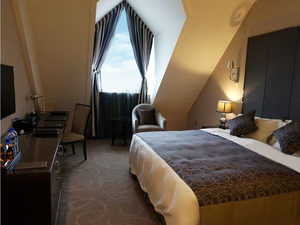 Imagen de la habitación del Hotel Venice Jianguo Dandong. Foto 12