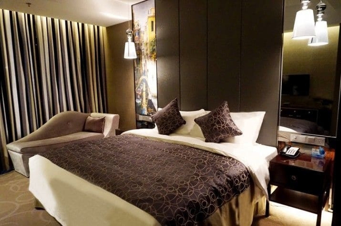 Imagen de la habitación del Hotel Venice Jianguo Dandong. Foto 15