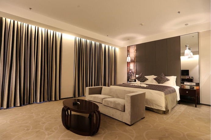 Imagen de la habitación del Hotel Venice Jianguo Dandong. Foto 17