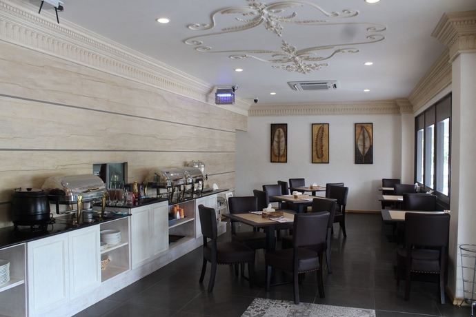 Imagen del bar/restaurante del Hotel Venice Lodge. Foto 5