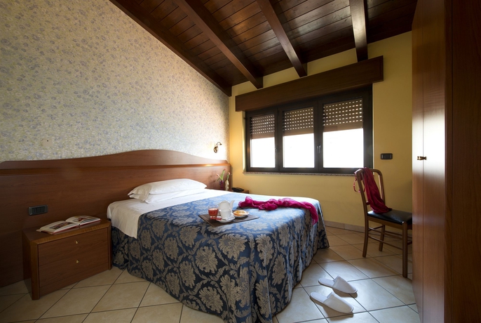 Imagen de la habitación del Hotel Venini. Foto 13