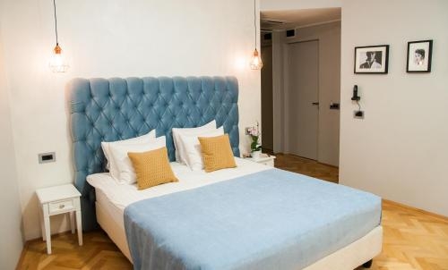 Imagen de la habitación del Hotel Venis Boutique Residence. Foto 8