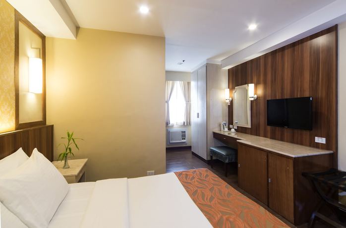 Imagen de la habitación del Hotel Veniz Burnham. Foto 5