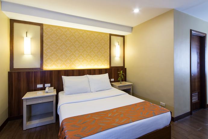 Imagen de la habitación del Hotel Veniz Burnham. Foto 15