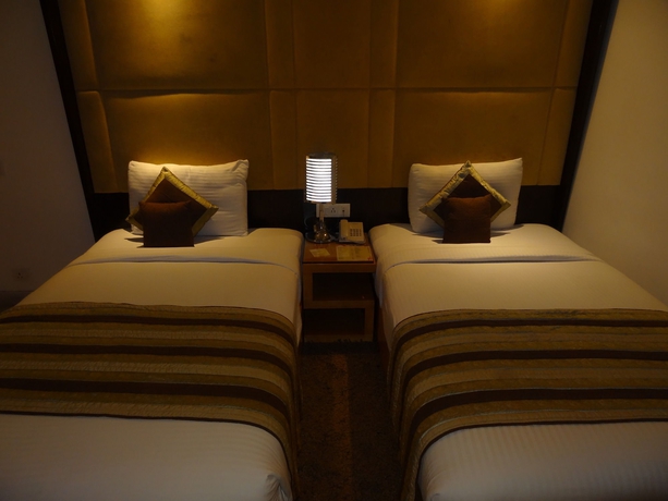 Imagen de la habitación del Hotel Venizia Sarovar Portico. Foto 3