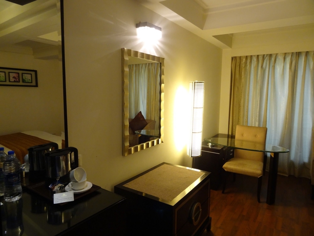 Imagen de la habitación del Hotel Venizia Sarovar Portico. Foto 10