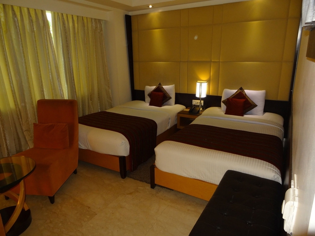 Imagen de la habitación del Hotel Venizia Sarovar Portico. Foto 11