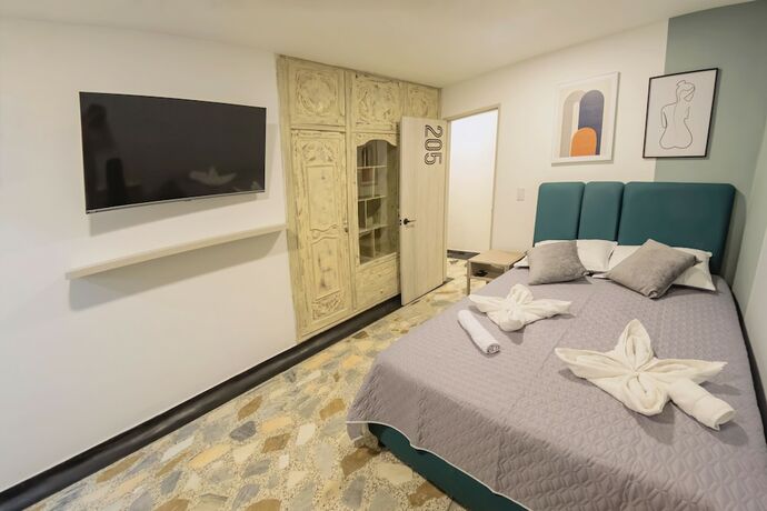 Imagen de la habitación del Hotel Ventiuna and Hostel. Foto 14