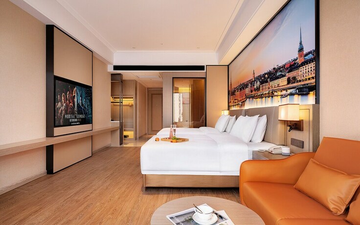 Imagen de la habitación del Hotel Venus International. Foto 12