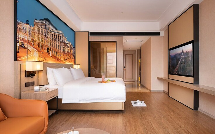 Imagen de la habitación del Hotel Venus International. Foto 13