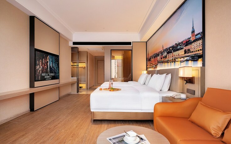 Imagen de la habitación del Hotel Venus International. Foto 14