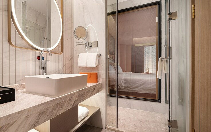 Imagen de la habitación del Hotel Venus International. Foto 15