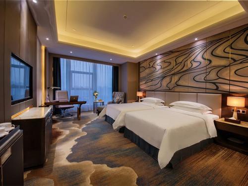 Imagen de la habitación del Hotel Venus Royal Liu Zhou Branch. Foto 6