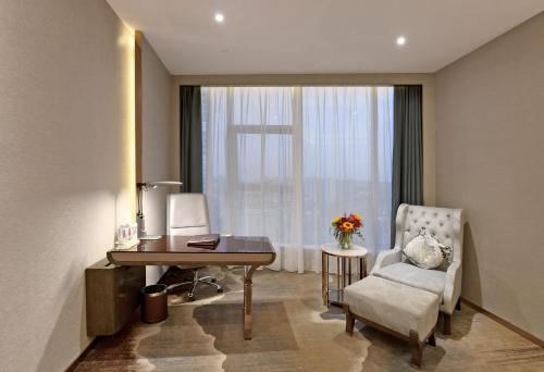 Imagen de la habitación del Hotel Venus Royal Liu Zhou Branch. Foto 10