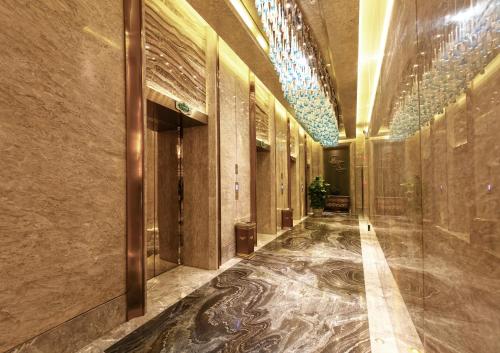 Imagen general del Hotel Venus Royal Liu Zhou Branch. Foto 5