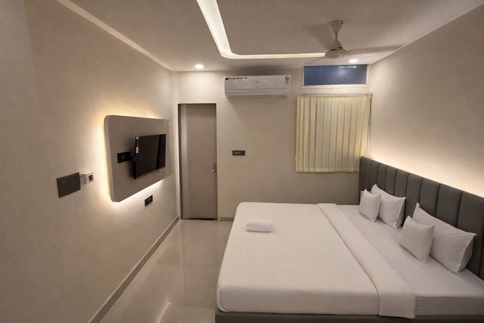 Imagen de la habitación del Hotel Venzaa Inn. Foto 5