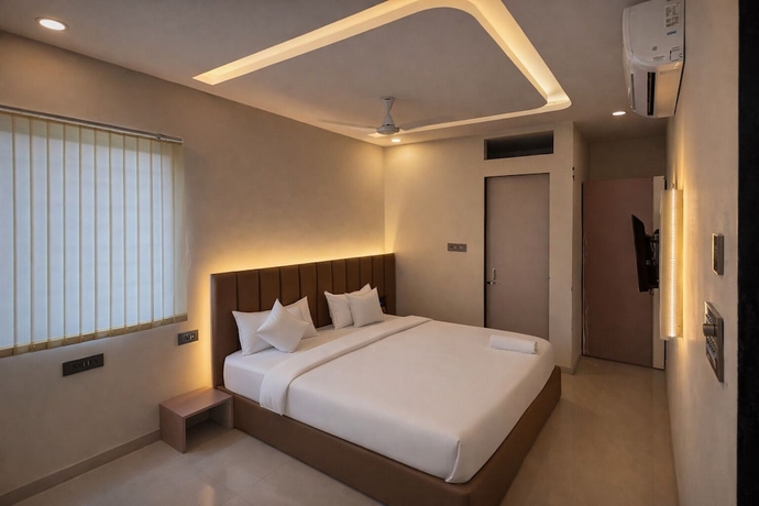 Imagen de la habitación del Hotel Venzaa Inn. Foto 6