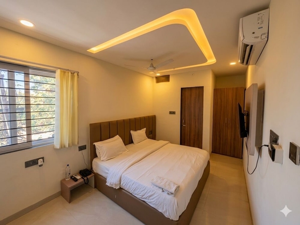 Imagen de la habitación del Hotel Venzaa Inn. Foto 7