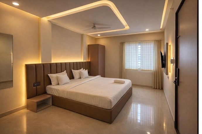 Imagen de la habitación del Hotel Venzaa Inn. Foto 8