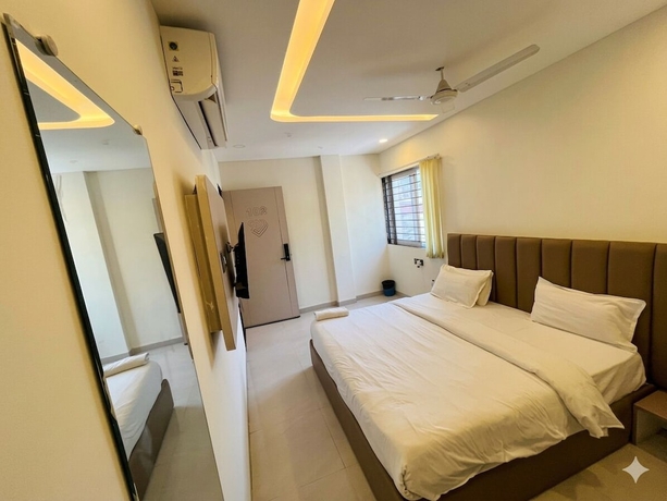 Imagen de la habitación del Hotel Venzaa Inn. Foto 9